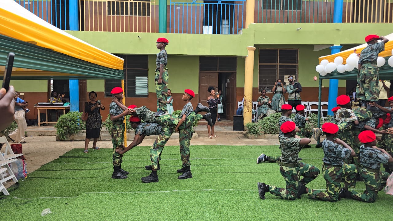 Cadet corps pupils performing a drill display in the courtyard